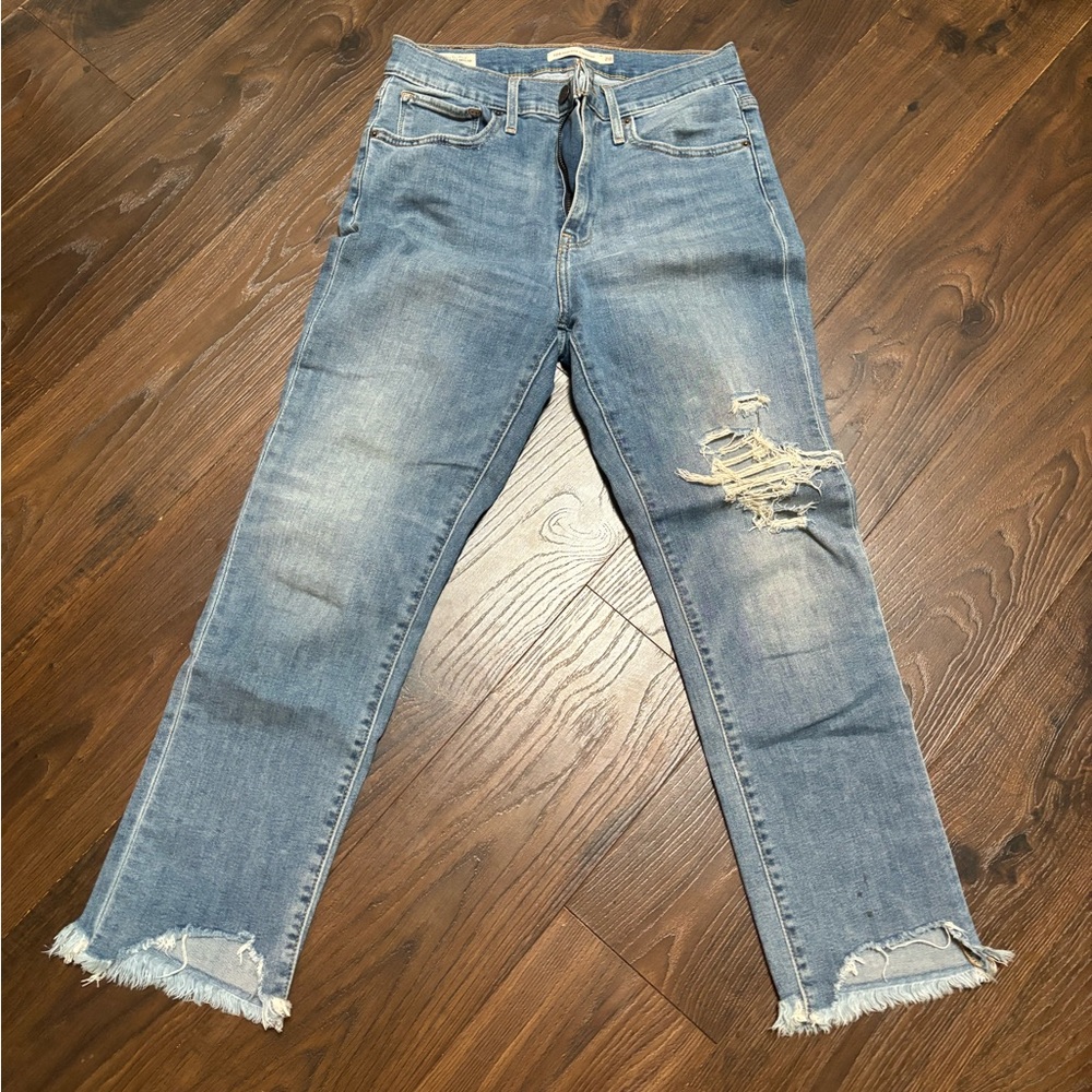 Levi's Light Blue Straight Leg Women’s Jeans with Distressed Hem
